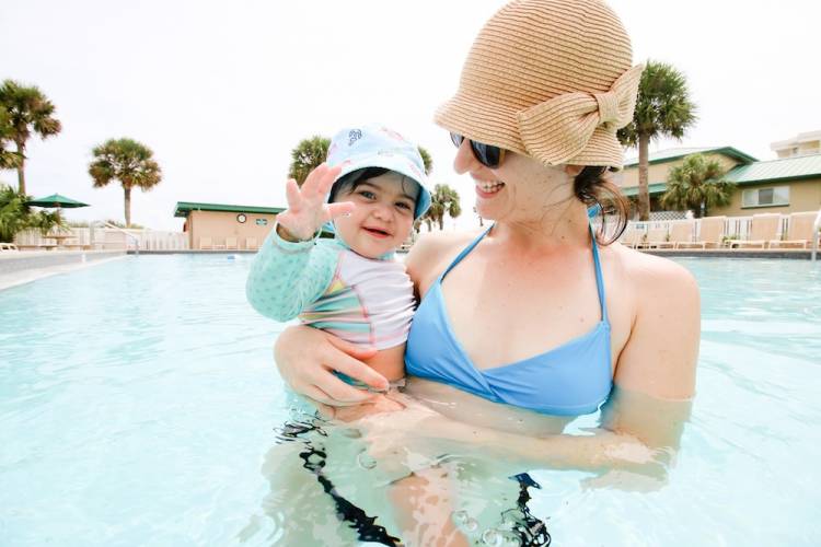 mom and baby in pool