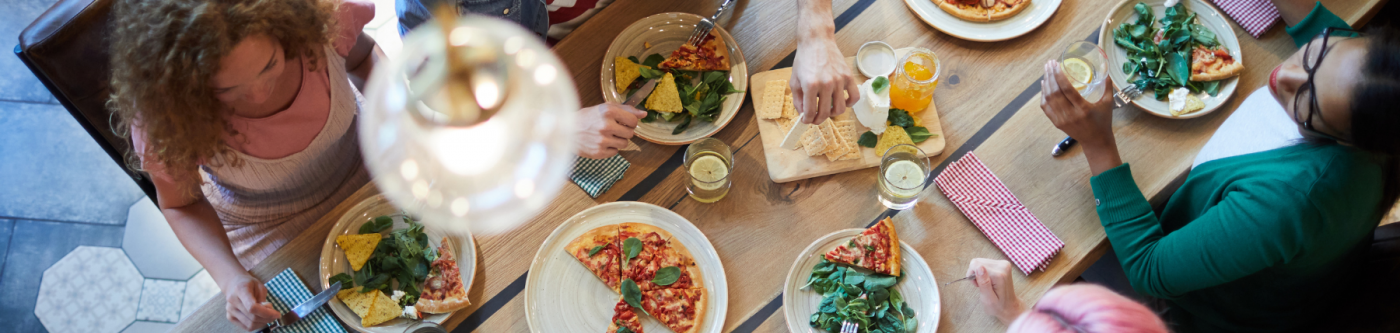 family dining out at restaurant