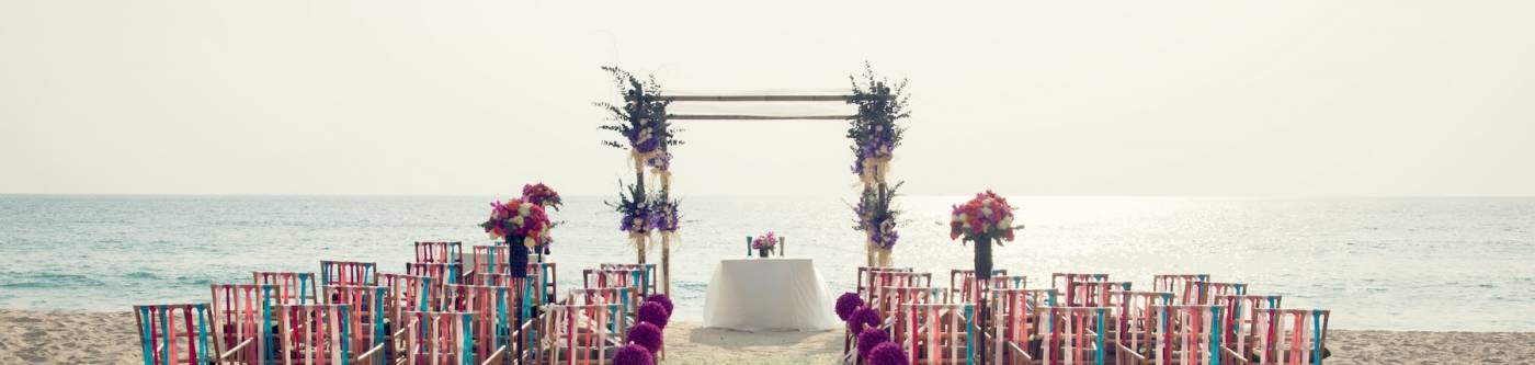 Wedding altar and chairs set up on beach